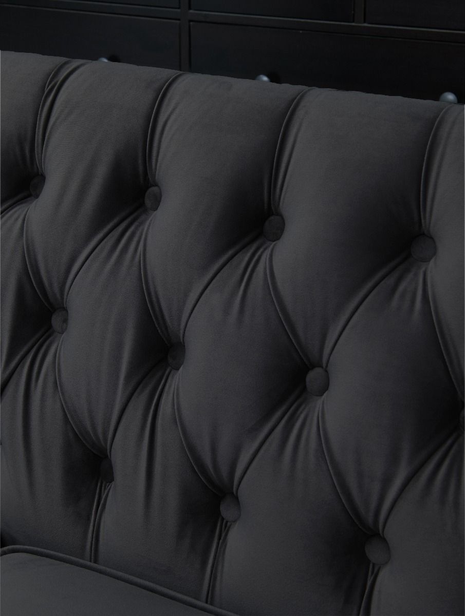 Black tufted sofa deals velvet