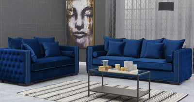 Royal blue tufted deals sofa